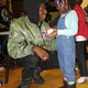 Musician Joey Bada$$ and a guest during the Flatbush YMCA holiday party in December 2015.